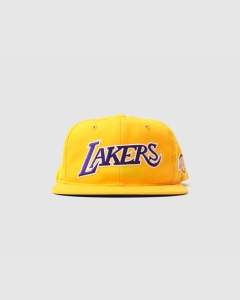 M and N LA Lakers Flatpeak Deadstock Snapback Yellow